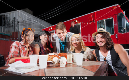To use this stock image in your creative project, please select the size you need over to the right and click the "Add to Cart" button.
Your downloaded image will come with the Cutcaster watermark removed so don’t worry about the watermark you see on this page. Smiling Patrons and Chef by Food Truck stock photo, Smiling patrons at table in front of chef and food truck by Scott Griessel