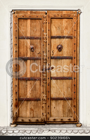To use this stock image in your creative project, please select the size you need over to the right and click the "Add to Cart" button.
Your downloaded image will come with the Cutcaster watermark removed so don’t worry about the watermark you see on this page. An old dilapidated wooden door stock photo, An old dilapidated wooden door of Indian home by Alexey Romanov
