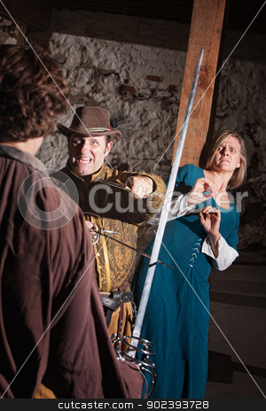 To use this stock image in your creative project, please select the size you need over to the right and click the "Add to Cart" button.
Your downloaded image will come with the Cutcaster watermark removed so don’t worry about the watermark you see on this page. Scared Woman and Sword Fighter stock photo, Scared medieval lady behind aggressive sword fighter in battle by Scott Griessel