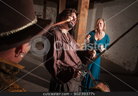 To use this stock image in your creative project, please select the size you need over to the right and click the "Add to Cart" button.
Your downloaded image will come with the Cutcaster watermark removed so don’t worry about the watermark you see on this page. Woman Watches Swordsman Get Hit stock photo, Sympathetic lady watches man get hit by mace in medieval battle by Scott Griessel