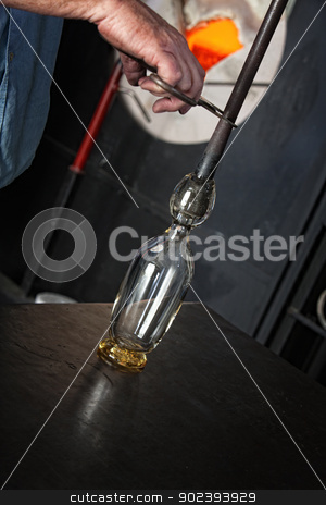 To use this stock image in your creative project, please select the size you need over to the right and click the "Add to Cart" button.
Your downloaded image will come with the Cutcaster watermark removed so don’t worry about the watermark you see on this page. Hot Glass on Table stock photo, Worker holding rod with hot glass on iron table by Scott Griessel