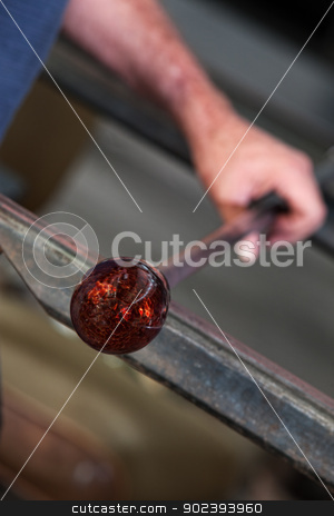 To use this stock image in your creative project, please select the size you need over to the right and click the "Add to Cart" button.
Your downloaded image will come with the Cutcaster watermark removed so don’t worry about the watermark you see on this page. Creating Glass Art stock photo, Rolling fine art glass vase cooling on iron workbench by Scott Griessel