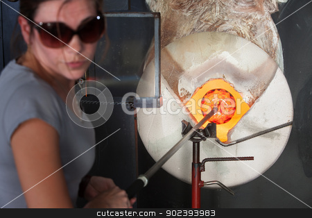 To use this stock image in your creative project, please select the size you need over to the right and click the "Add to Cart" button.
Your downloaded image will come with the Cutcaster watermark removed so don’t worry about the watermark you see on this page. Woman Working at Kiln stock photo, Young female glass artist putting object in hot kiln by Scott Griessel