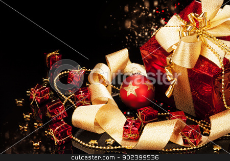 To use this stock image in your creative project, please select the size you need over to the right and click the "Add to Cart" button.
Your downloaded image will come with the Cutcaster watermark removed so don’t worry about the watermark you see on this page. red christmas present with a red christmas ball and ribbons on black background stock photo, red christmas present with a red christmas ball and ribbons on black background by Rob Stark