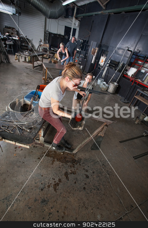 To use this stock image in your creative project, please select the size you need over to the right and click the "Add to Cart" button.
Your downloaded image will come with the Cutcaster watermark removed so don’t worry about the watermark you see on this page. Worker Holding Red Hot Glass stock photo, Female factory worker holding red hot glass with mitt by Scott Griessel