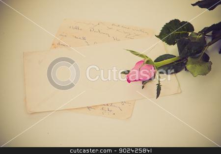 To use this stock image in your creative project, please select the size you need over to the right and click the "Add to Cart" button.
Your downloaded image will come with the Cutcaster watermark removed so don’t worry about the watermark you see on this page. love letter stock photo, old retro vintage love letter with rose. by mandygodbehear
