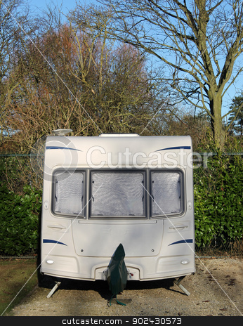 To use this stock image in your creative project, please select the size you need over to the right and click the "Add to Cart" button.
Your downloaded image will come with the Cutcaster watermark removed so don’t worry about the watermark you see on this page. Caravan in countryside stock photo, Front view of white caravan in the countryside. by Martin Crowdy