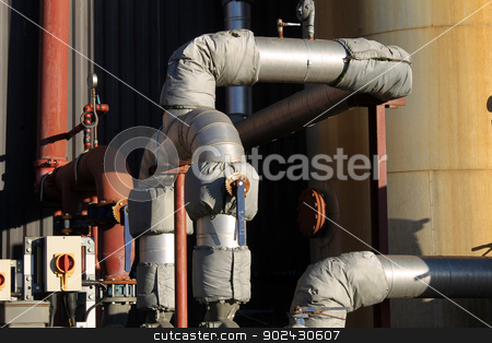 To use this stock image in your creative project, please select the size you need over to the right and click the "Add to Cart" button.
Your downloaded image will come with the Cutcaster watermark removed so don’t worry about the watermark you see on this page. Industrial building exterior stock photo, Exterior of industrial factory building with pipes and lagging. by Martin Crowdy