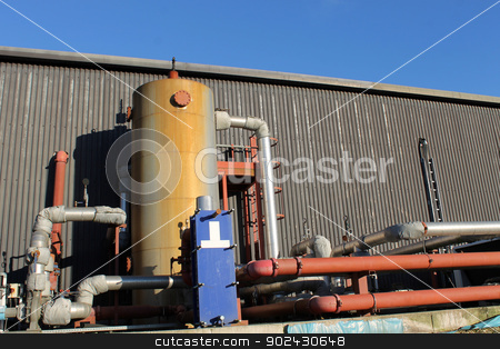 To use this stock image in your creative project, please select the size you need over to the right and click the "Add to Cart" button.
Your downloaded image will come with the Cutcaster watermark removed so don’t worry about the watermark you see on this page. Modern industrial building stock photo, Exterior of modern industrial building with pipes and tank. by Martin Crowdy
