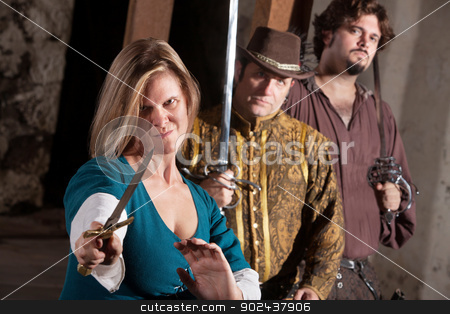 To use this stock image in your creative project, please select the size you need over to the right and click the "Add to Cart" button.
Your downloaded image will come with the Cutcaster watermark removed so don’t worry about the watermark you see on this page. Tough Medieval Lady with Dagger stock photo, Tough smirking medieval woman with dagger and friends by Scott Griessel