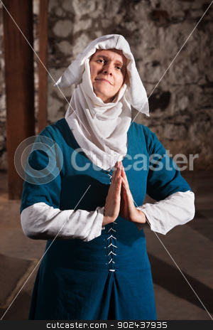 To use this stock image in your creative project, please select the size you need over to the right and click the "Add to Cart" button.
Your downloaded image will come with the Cutcaster watermark removed so don’t worry about the watermark you see on this page. Righteous Medieval Nun stock photo, Righteous medieval nun with palms together in prayer by Scott Griessel