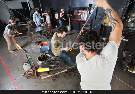 To use this stock image in your creative project, please select the size you need over to the right and click the "Add to Cart" button.
Your downloaded image will come with the Cutcaster watermark removed so don’t worry about the watermark you see on this page. Students Making Glass Art stock photo, Group of students busy in glass art workshop by Scott Griessel