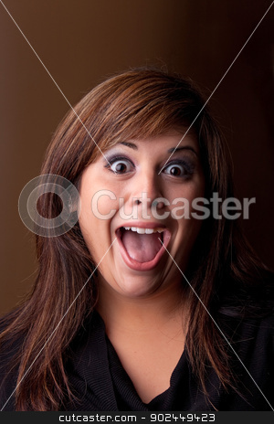 To use this stock image in your creative project, please select the size you need over to the right and click the "Add to Cart" button.
Your downloaded image will come with the Cutcaster watermark removed so don’t worry about the watermark you see on this page. Crazy Girl Screaming stock photo, Woman with a funny look on her face smiles over a dark background. by Todd Arena