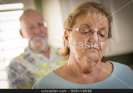 To use this stock image in your creative project, please select the size you need over to the right and click the "Add to Cart" button.
Your downloaded image will come with the Cutcaster watermark removed so don’t worry about the watermark you see on this page. Senior Adult Couple in Dispute or Consoling stock photo, Senior Adult Couple in Dispute or Consoling in Kitchen of House. by Andy Dean