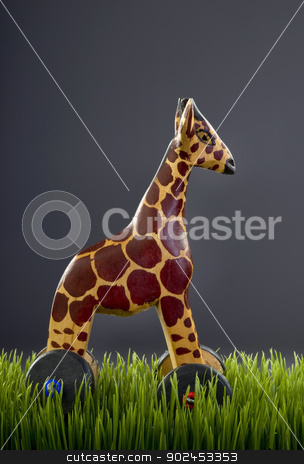 To use this stock image in your creative project, please select the size you need over to the right and click the "Add to Cart" button.
Your downloaded image will come with the Cutcaster watermark removed so don’t worry about the watermark you see on this page. Wooden Toy Giraffe. stock photo, Wooden toy with room for your type. by WScott
