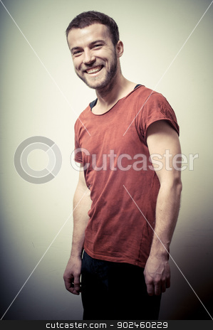 To use this stock image in your creative project, please select the size you need over to the right and click the "Add to Cart" button.
Your downloaded image will come with the Cutcaster watermark removed so don’t worry about the watermark you see on this page. vintage portrait of smiling fashion guy stock photo, vintage portrait of smiling fashion guy on gray background by Eugenio Marongiu