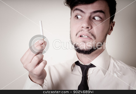 To use this stock image in your creative project, please select the size you need over to the right and click the "Add to Cart" button.
Your downloaded image will come with the Cutcaster watermark removed so don’t worry about the watermark you see on this page. businessman stop smoking stock photo, businessman stop smoking on gray background by Eugenio Marongiu