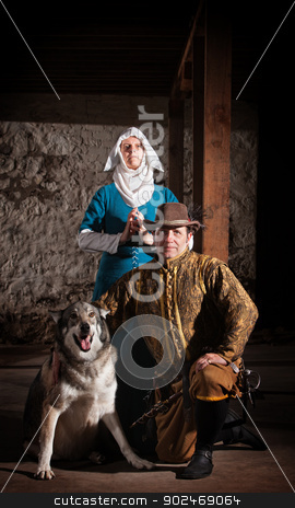 To use this stock image in your creative project, please select the size you need over to the right and click the "Add to Cart" button.
Your downloaded image will come with the Cutcaster watermark removed so don’t worry about the watermark you see on this page. Medieval Characters with Dog stock photo, Nun behind kneeling swashbuckler and dog in medieval character by Scott Griessel