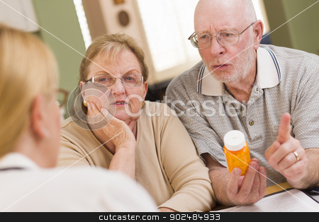 To use this stock image in your creative project, please select the size you need over to the right and click the "Add to Cart" button.
Your downloaded image will come with the Cutcaster watermark removed so don’t worry about the watermark you see on this page. Doctor or Nurse Explaining Prescription Medicine to Senior Coupl stock photo, Doctor or Nurse Explaining Prescription Medicine to Attentive Senior Couple. by Andy Dean