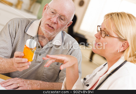 To use this stock image in your creative project, please select the size you need over to the right and click the "Add to Cart" button.
Your downloaded image will come with the Cutcaster watermark removed so don’t worry about the watermark you see on this page. Doctor or Nurse Explaining Prescription Medicine to Senior Man stock photo, Doctor or Nurse Explaining Prescription Medicine to Attentive Senior Man. by Andy Dean