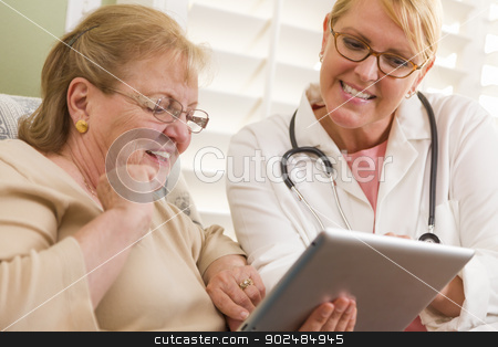 To use this stock image in your creative project, please select the size you need over to the right and click the "Add to Cart" button.
Your downloaded image will come with the Cutcaster watermark removed so don’t worry about the watermark you see on this page. Doctor or Nurse Talking to Senior Woman with Touch Pad stock photo, Doctor or Nurse Talking to Senior Woman with Touch Pad Computer. by Andy Dean