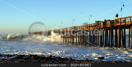To use this stock image in your creative project, please select the size you need over to the right and click the "Add to Cart" button.
Your downloaded image will come with the Cutcaster watermark removed so don’t worry about the watermark you see on this page. Ocean Wave Storm Pier stock photo, Ocean waves throughout at storm crashing into a wooden pier. by Henrik Lehnerer