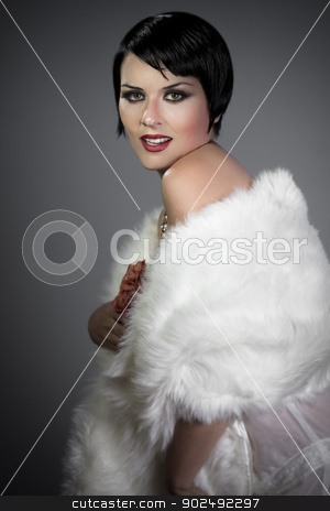 To use this stock image in your creative project, please select the size you need over to the right and click the "Add to Cart" button.
Your downloaded image will come with the Cutcaster watermark removed so don’t worry about the watermark you see on this page. sensuous short haired brunette woman, bare shoulders with white stock photo, sensuous short haired brunette woman, bare shoulders with white fur, flirty, 20s hollywood style by Fernando Cortes