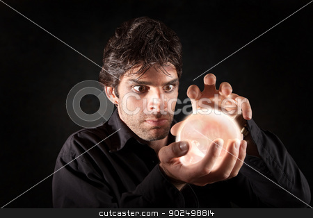 To use this stock image in your creative project, please select the size you need over to the right and click the "Add to Cart" button.
Your downloaded image will come with the Cutcaster watermark removed so don’t worry about the watermark you see on this page. Man With Crystal Ball stock photo, Male fortune-teller gazes over a crystal ball by Scott Griessel