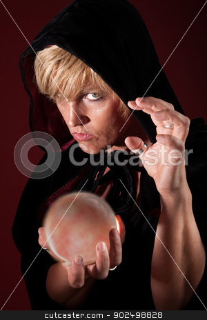 To use this stock image in your creative project, please select the size you need over to the right and click the "Add to Cart" button.
Your downloaded image will come with the Cutcaster watermark removed so don’t worry about the watermark you see on this page. Fortune Teller stock photo, Hooded blonde female fortuneteller with her crystal ball by Scott Griessel