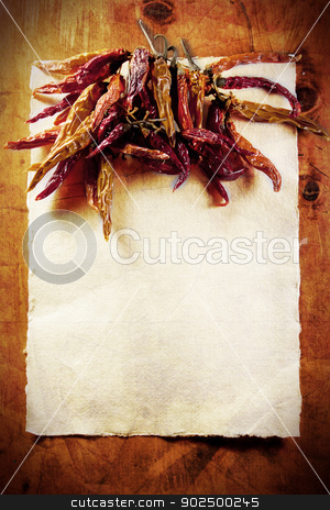 To use this stock image in your creative project, please select the size you need over to the right and click the "Add to Cart" button.
Your downloaded image will come with the Cutcaster watermark removed so don’t worry about the watermark you see on this page. Dried peppers frame stock photo, Dried peppers border on a vintage paper background on an old wooden table. Plenty of copyspace– perfect for a themed restaurant menu or a preserve label. by Piccia Neri