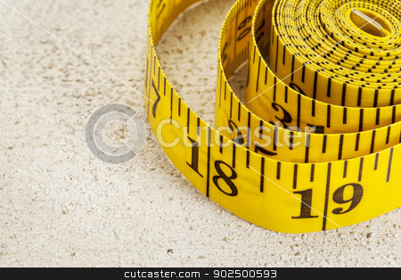 To use this stock image in your creative project, please select the size you need over to the right and click the "Add to Cart" button.
Your downloaded image will come with the Cutcaster watermark removed so don’t worry about the watermark you see on this page. tape measure stock photo, yellow inch tape measure on a rough white painted barn wood background by Marek Uliasz