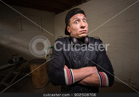 To use this stock image in your creative project, please select the size you need over to the right and click the "Add to Cart" button.
Your downloaded image will come with the Cutcaster watermark removed so don’t worry about the watermark you see on this page. Anxious Man with Headphones stock photo, Nervous man with headphones and folded arms by Scott Griessel