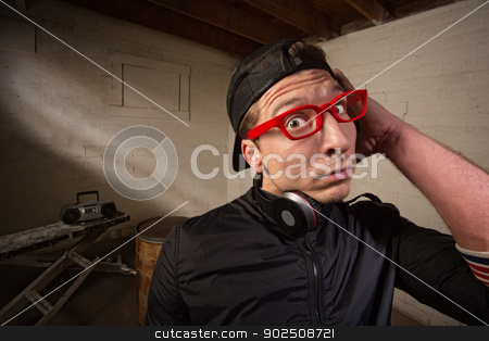 To use this stock image in your creative project, please select the size you need over to the right and click the "Add to Cart" button.
Your downloaded image will come with the Cutcaster watermark removed so don’t worry about the watermark you see on this page. Startled European Man stock photo, Startled man with red eyeglasses and headphones by Scott Griessel