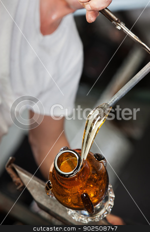 To use this stock image in your creative project, please select the size you need over to the right and click the "Add to Cart" button.
Your downloaded image will come with the Cutcaster watermark removed so don’t worry about the watermark you see on this page. Oozing Glass on Vase stock photo, Molten glass oozing from rod around new vase by Scott Griessel