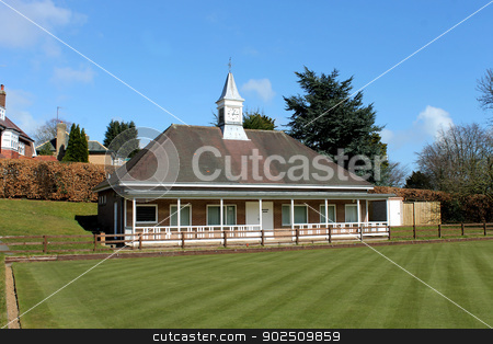 To use this stock image in your creative project, please select the size you need over to the right and click the "Add to Cart" button.
Your downloaded image will come with the Cutcaster watermark removed so don’t worry about the watermark you see on this page. English bowling green and pavilion stock photo, Scenic view of English bowling green and pavilion with clock tower. by Martin Crowdy