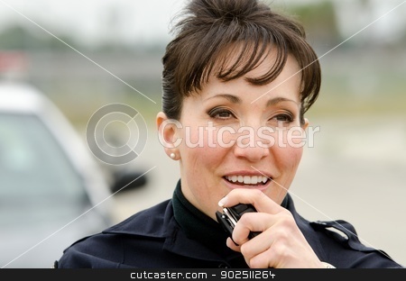 To use this stock image in your creative project, please select the size you need over to the right and click the "Add to Cart" button.
Your downloaded image will come with the Cutcaster watermark removed so don’t worry about the watermark you see on this page. Police radio stock photo, a female police officer talks on the radio with her patrol car in the background. by John Roman
