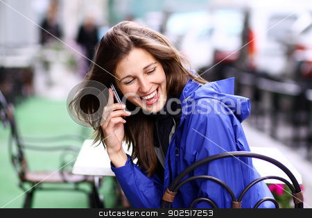To use this stock image in your creative project, please select the size you need over to the right and click the "Add to Cart" button.
Your downloaded image will come with the Cutcaster watermark removed so don’t worry about the watermark you see on this page. Closeup woman with mobile telephone stock photo, Happy young lady talking on mobile phone by andersonrise
