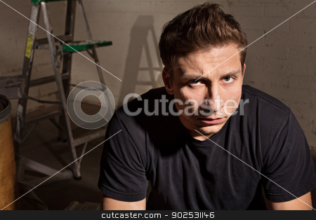 To use this stock image in your creative project, please select the size you need over to the right and click the "Add to Cart" button.
Your downloaded image will come with the Cutcaster watermark removed so don’t worry about the watermark you see on this page. Angry Male with Ladder stock photo, Angry young white man with ladder in background by Scott Griessel