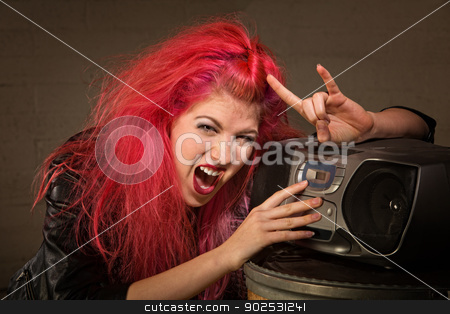 To use this stock image in your creative project, please select the size you need over to the right and click the "Add to Cart" button.
Your downloaded image will come with the Cutcaster watermark removed so don’t worry about the watermark you see on this page. Excited Teen with Radio stock photo, Excited teenager with pink hair and radio making hand gesture by Scott Griessel