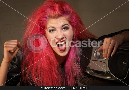 To use this stock image in your creative project, please select the size you need over to the right and click the "Add to Cart" button.
Your downloaded image will come with the Cutcaster watermark removed so don’t worry about the watermark you see on this page. Shouting Girl by Radio stock photo, Shouting young lady in pink with clenched fist and radio by Scott Griessel