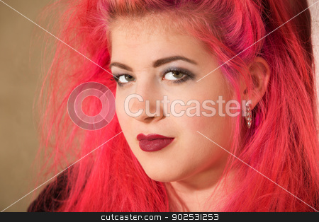 To use this stock image in your creative project, please select the size you need over to the right and click the "Add to Cart" button.
Your downloaded image will come with the Cutcaster watermark removed so don’t worry about the watermark you see on this page. Confident Teen with Pink Hair stock photo, Close up of pretty punk girl in pink hair by Scott Griessel