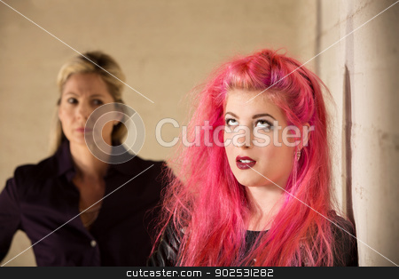To use this stock image in your creative project, please select the size you need over to the right and click the "Add to Cart" button.
Your downloaded image will come with the Cutcaster watermark removed so don’t worry about the watermark you see on this page. Annoyed Parent and Child stock photo, Annoyed girl in pink hair with upset parent by Scott Griessel