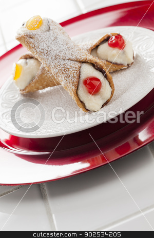 To use this stock image in your creative project, please select the size you need over to the right and click the "Add to Cart" button.
Your downloaded image will come with the Cutcaster watermark removed so don’t worry about the watermark you see on this page. Two Tasty Cannoli on Plate stock photo, Two Tasty Cannoli on a Plate. by Andy Dean