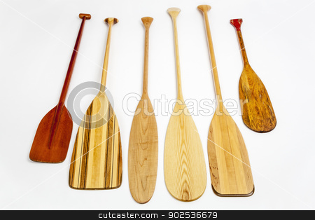 To use this stock image in your creative project, please select the size you need over to the right and click the "Add to Cart" button.
Your downloaded image will come with the Cutcaster watermark removed so don’t worry about the watermark you see on this page. wooden canoe paddles stock photo, wooden canoe paddles of different shapes and sizes including a classic beaver tail on white background, focus on blades by Marek Uliasz