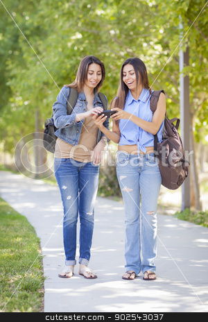 To use this stock image in your creative project, please select the size you need over to the right and click the "Add to Cart" button.
Your downloaded image will come with the Cutcaster watermark removed so don’t worry about the watermark you see on this page. Young Adult Mixed Race Twin Sisters Sharing Cell Phone Experienc stock photo, Young Adult Mixed Race Twin Sisters Sharing Cell Phone Experience Outside. by Andy Dean