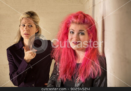 To use this stock image in your creative project, please select the size you need over to the right and click the "Add to Cart" button.
Your downloaded image will come with the Cutcaster watermark removed so don’t worry about the watermark you see on this page. Smiling Woman and Mother stock photo, Concerned mother pointing at grinning daughter in pink hair by Scott Griessel