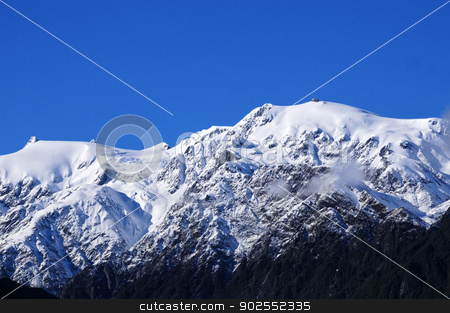 To use this stock image in your creative project, please select the size you need over to the right and click the "Add to Cart" button.
Your downloaded image will come with the Cutcaster watermark removed so don’t worry about the watermark you see on this page. Snow covered mountains stock photo, Snow covered mountains near Franz Josef glacier New Zealand by Bonnie Fink