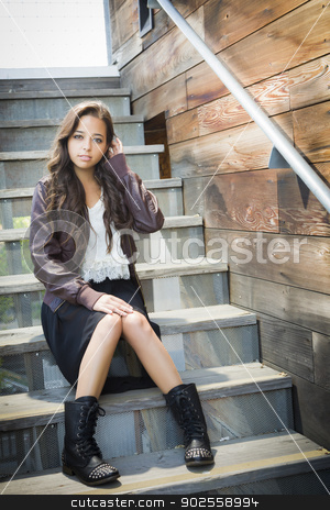 To use this stock image in your creative project, please select the size you need over to the right and click the "Add to Cart" button.
Your downloaded image will come with the Cutcaster watermark removed so don’t worry about the watermark you see on this page. Mixed Race Young Adult Woman Portrait on Staircase stock photo, Portrait of a Pretty Mixed Race Young Adult Woman Sitting on a Staircase Wearing Leather Boots and Jacket. by Andy Dean