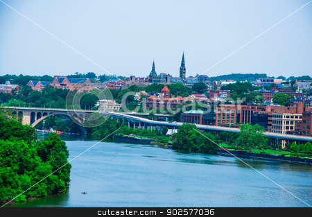 To use this stock image in your creative project, please select the size you need over to the right and click the "Add to Cart" button.
Your downloaded image will come with the Cutcaster watermark removed so don’t worry about the watermark you see on this page. elevated view of Washington DC by the Potomac river. In the picture are Key bridge, and Georgetown waterfront park and harbor. stock photo, by Hang Dinh