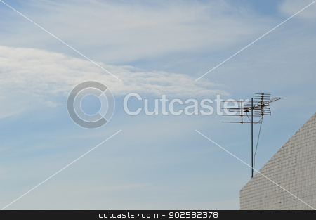 To use this stock image in your creative project, please select the size you need over to the right and click the "Add to Cart" button.
Your downloaded image will come with the Cutcaster watermark removed so don’t worry about the watermark you see on this page. TV antenna on the roof top stock photo, TV antenna on the roof top with blue sky by Lekchangply